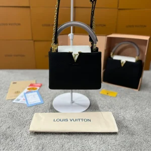 Bolso LV negra y blanca logo dorado